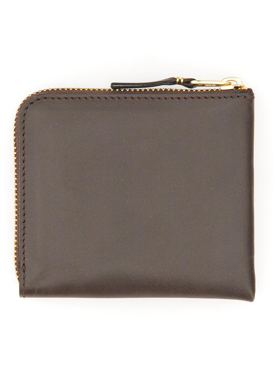 COMME DES GARCONS WALLET PORTAFOGLIO IN PELLE CON ZIP Comprane uno, ottenene uno gratis